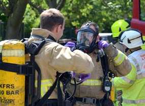 Crews put out the blaze in the oil-fuelled stove. Stock image