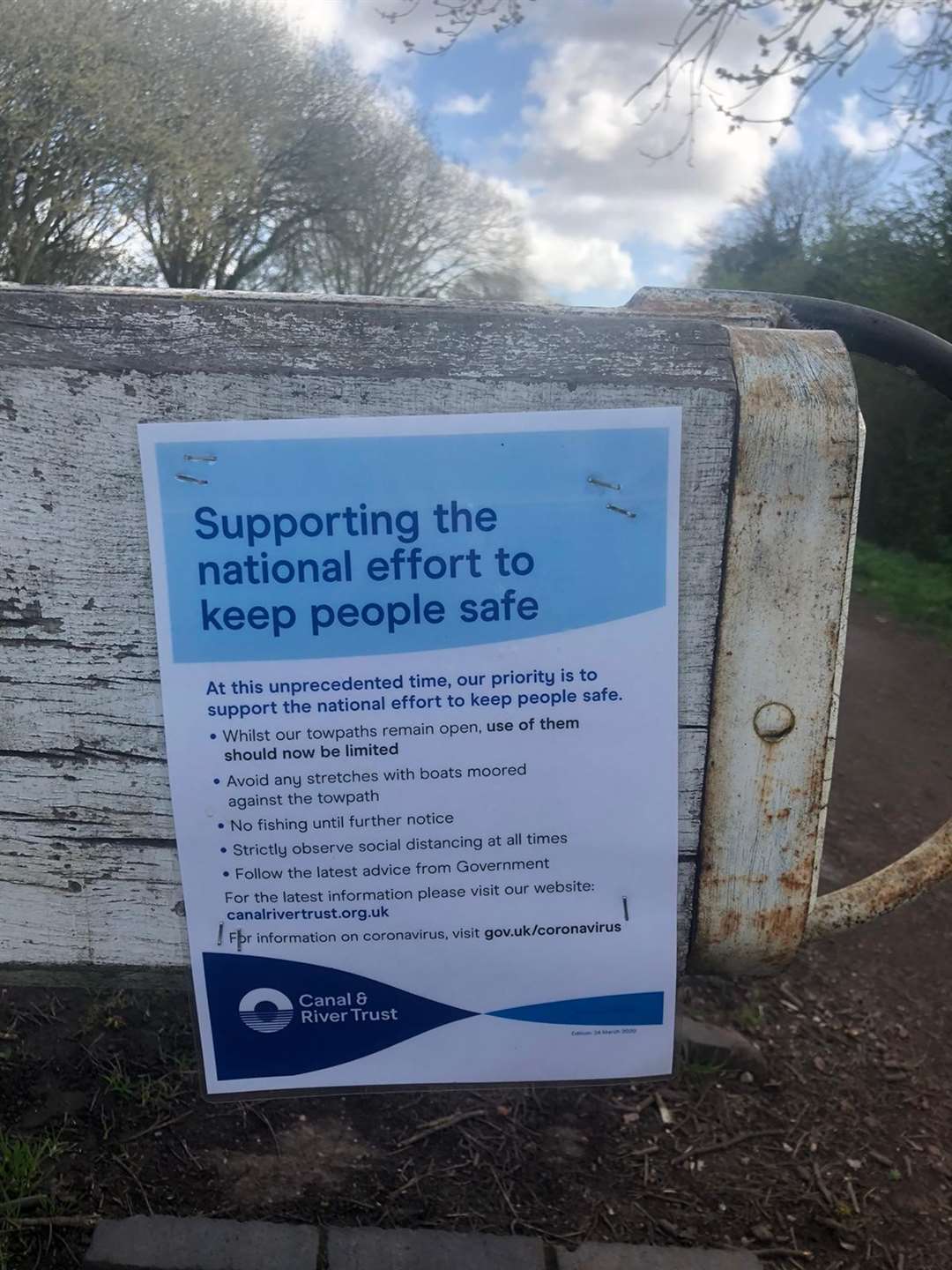 A Canal & River Trust advisory poster on a lock on the Worcester & Birmingham Canal (Claire Riches/PA)