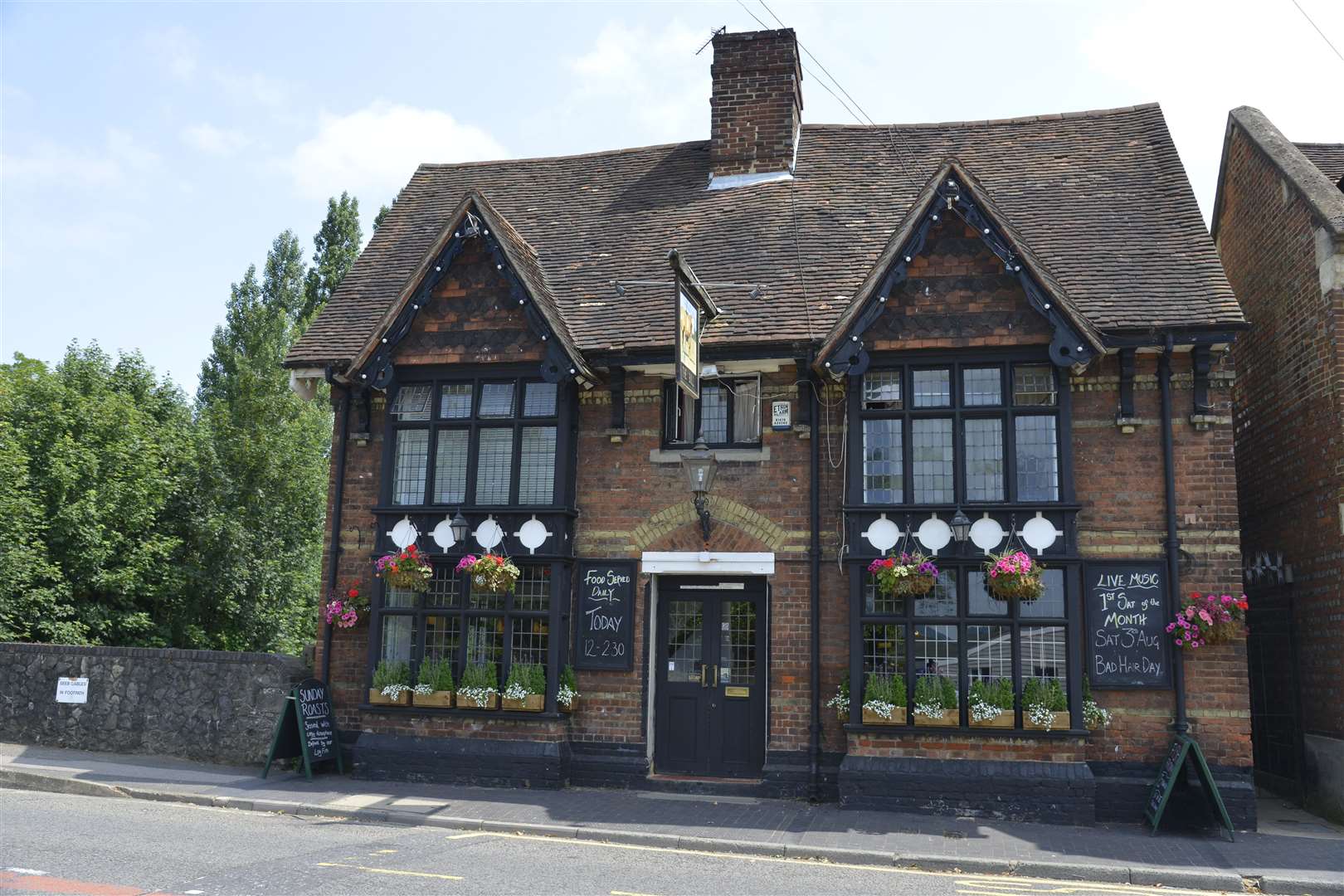 The Bull Inn is still serving pints to punters in West Malling. Picture: Martin Apps
