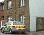 Police at the woman's home. Picture: TERRY SCOTT