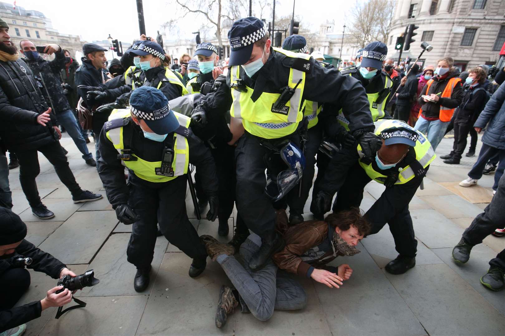 Police scuffle with demonstrators during a ‘Kill The Bill’ protest in London (Jonathan Brady/PA)