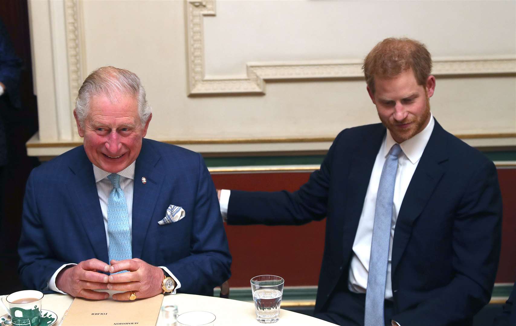 The Duke of Sussex, right, with his father the Prince of Wales (Steve Parsons/PA)