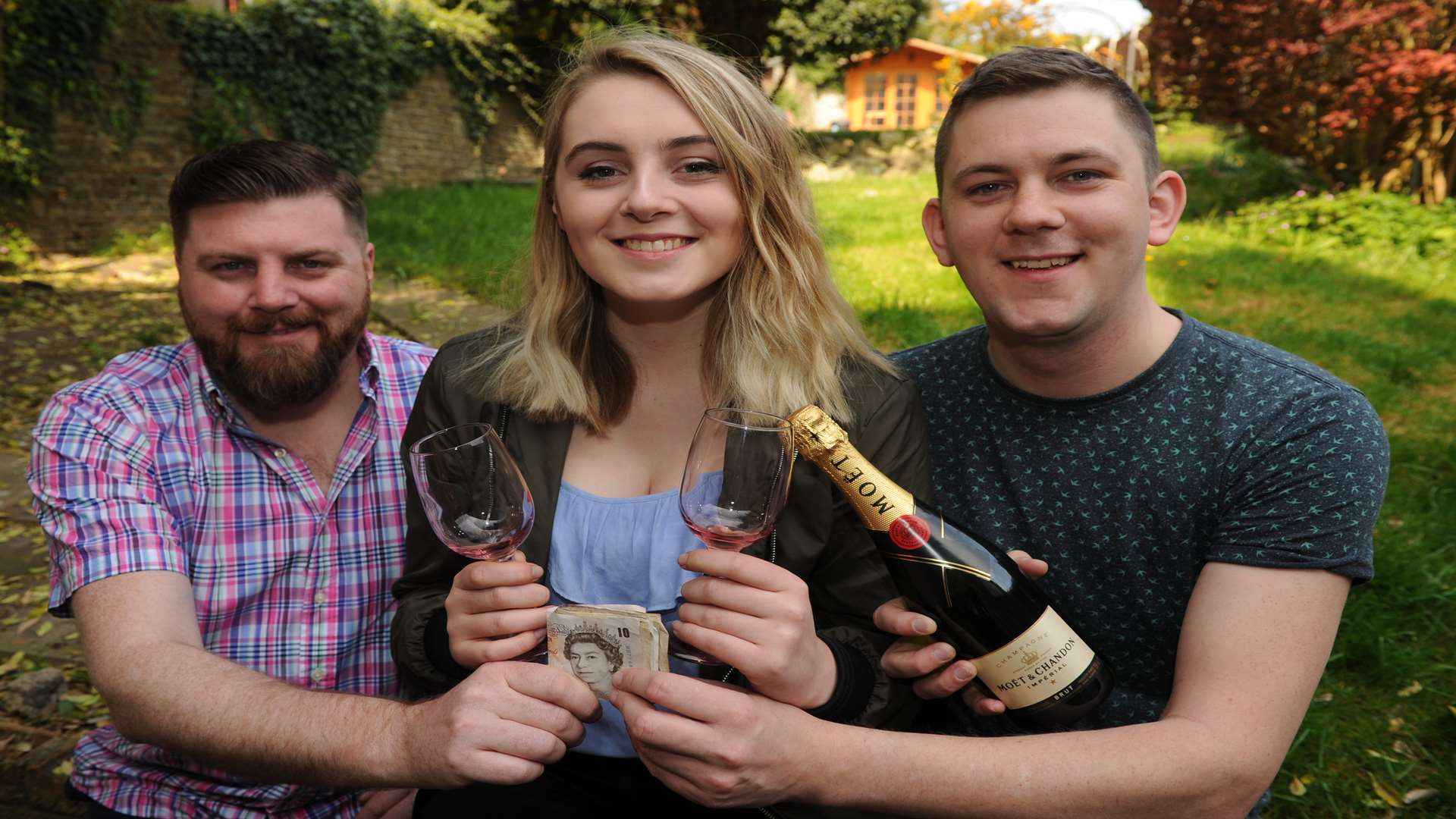 Nicole with her dad Spencer (left) and uncle Myles (right)