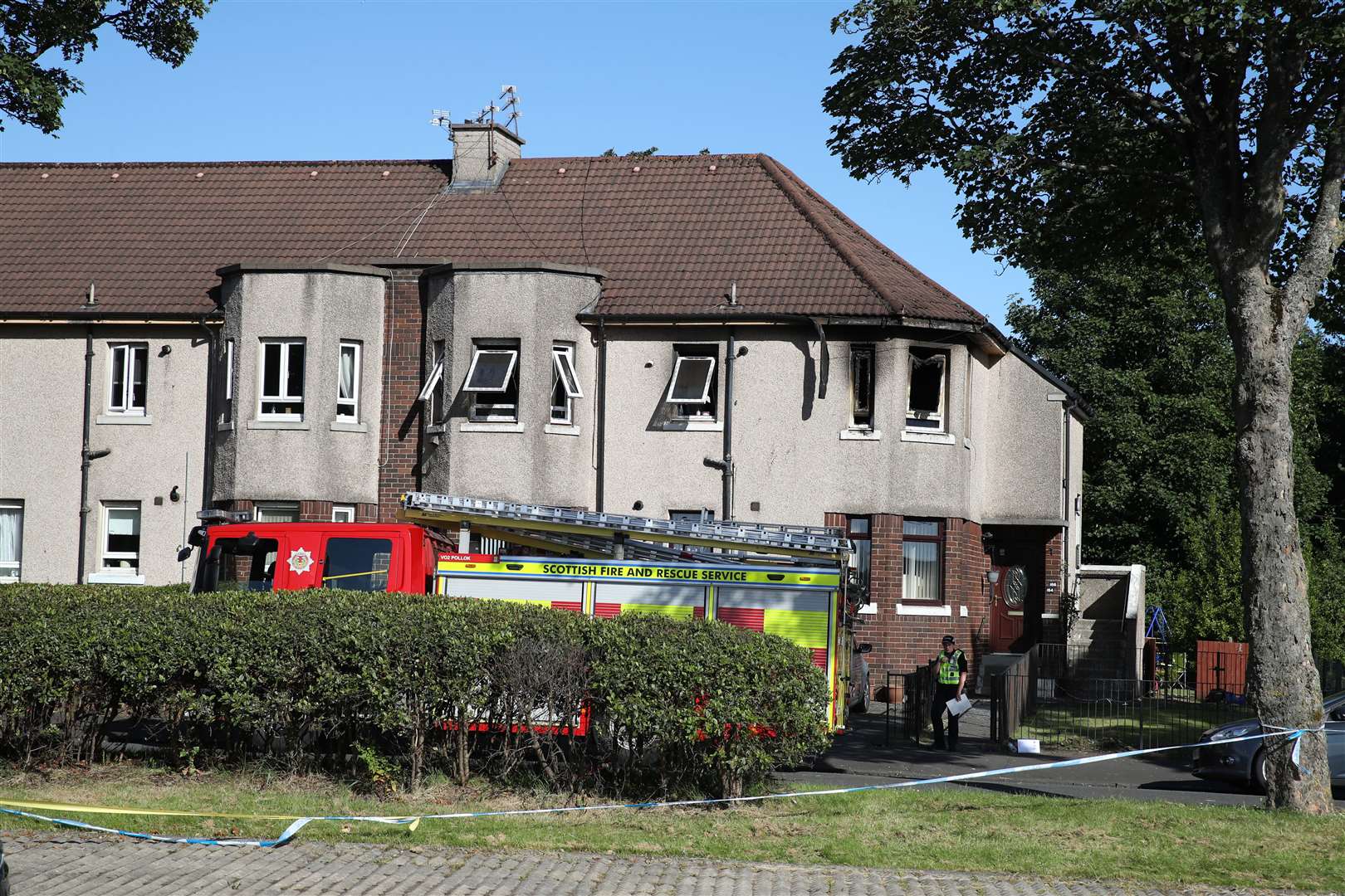 Firefighters at the scene in Paisley after the blaze on Friday night (Andrew Milligan/PA)