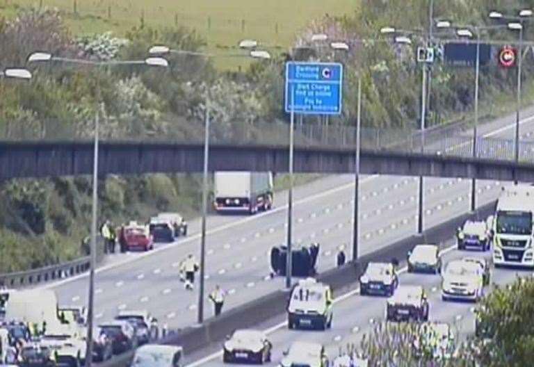 Traffic held on M25 after car overturns near Junction 2 for Darenth ...