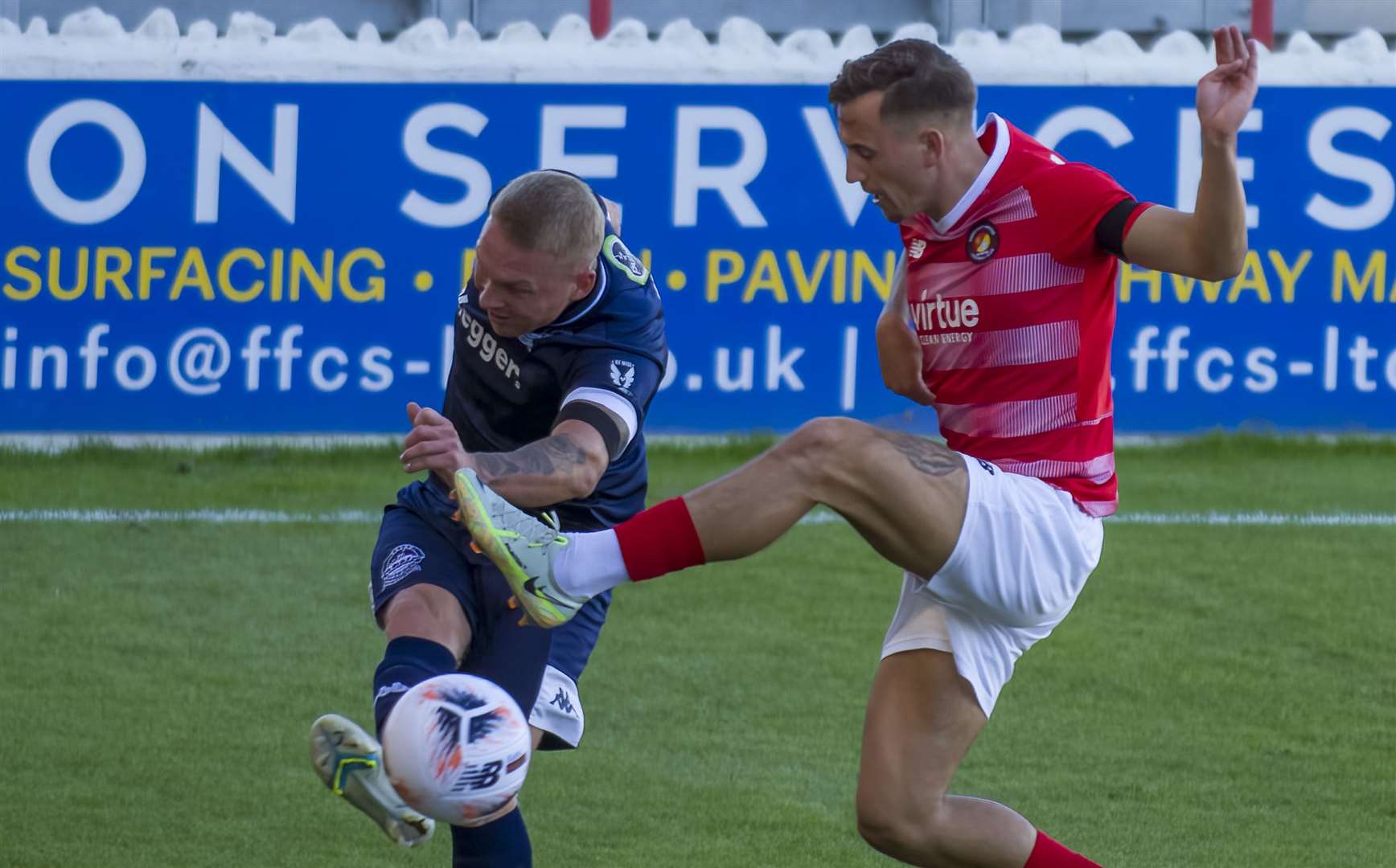 Ebbsfleet United's Ben Chapman closes down Dover Athletic full-back Myles Judd during the FA Cup tie on Saturday which the hosts won 2-0 at Stonebridge Road. Picture: Ed Miller / EUFC