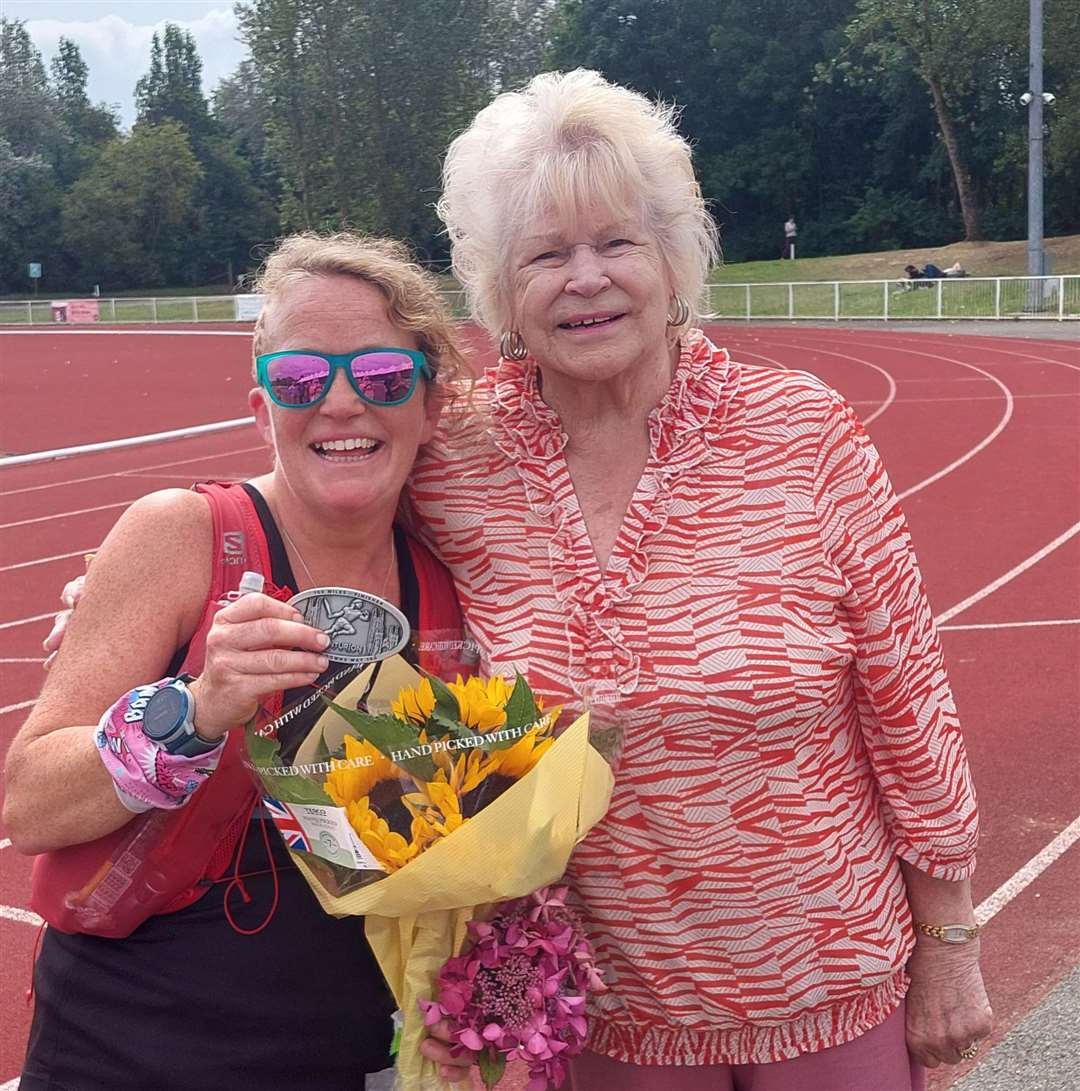 Folkestone's Jodie Jackman with grandmother Valerie at the finish line at the Julie Rose Stadium in Ashford