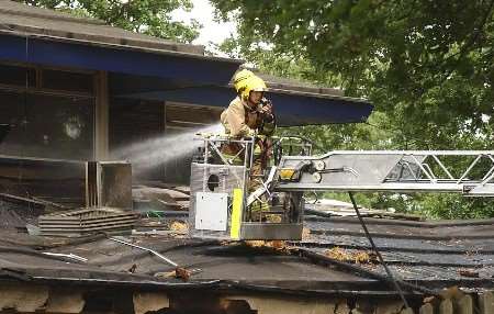 Firefighters tackling the second blaze this afternoon. Picture: BARRY CRAYFORD