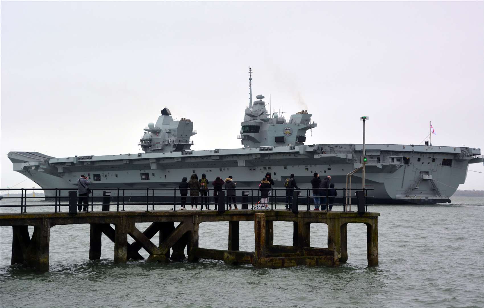HMS Prince of Wales leaving Portsmouth Naval Base for the first time earlier this year (Ben Mitchell/PA)