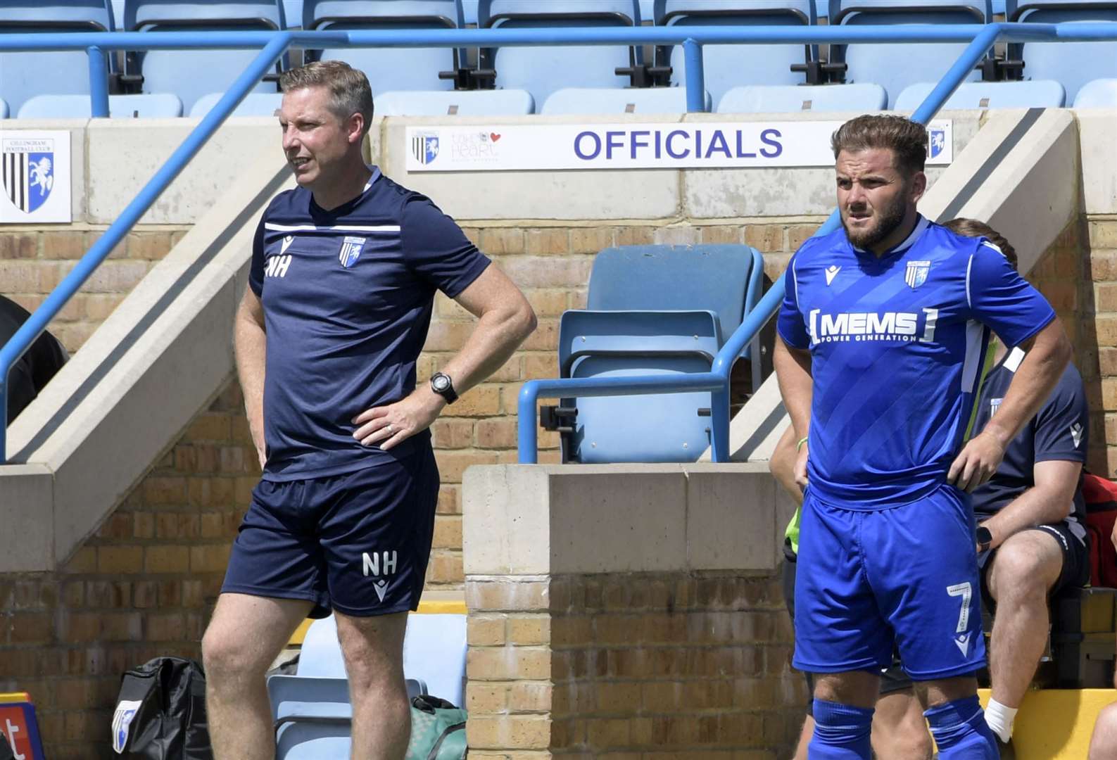 Manager Neil Harris with Alex MacDonald as the midfielder prepares to return to action at Priestfield Picture: Barry Goodwin