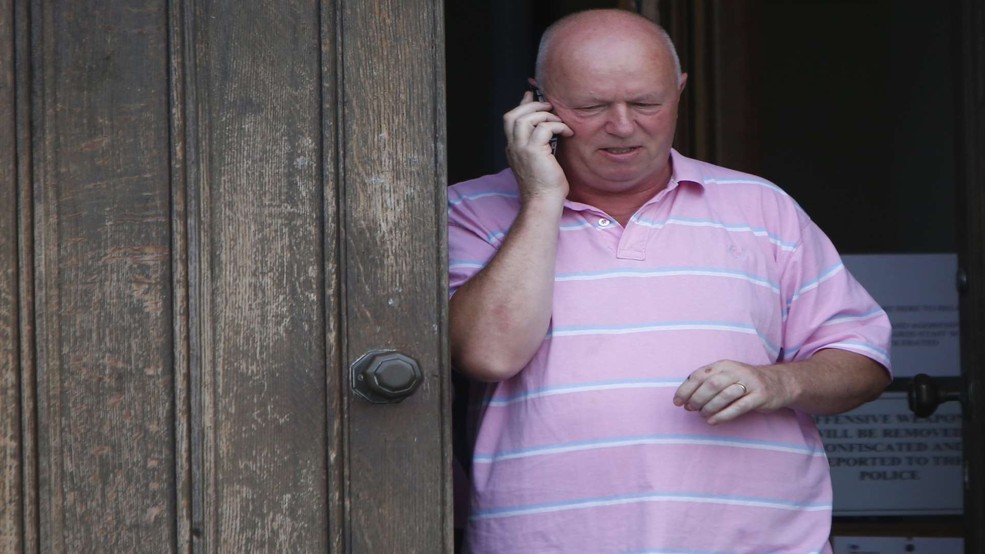 David Hoskin leaving the court building