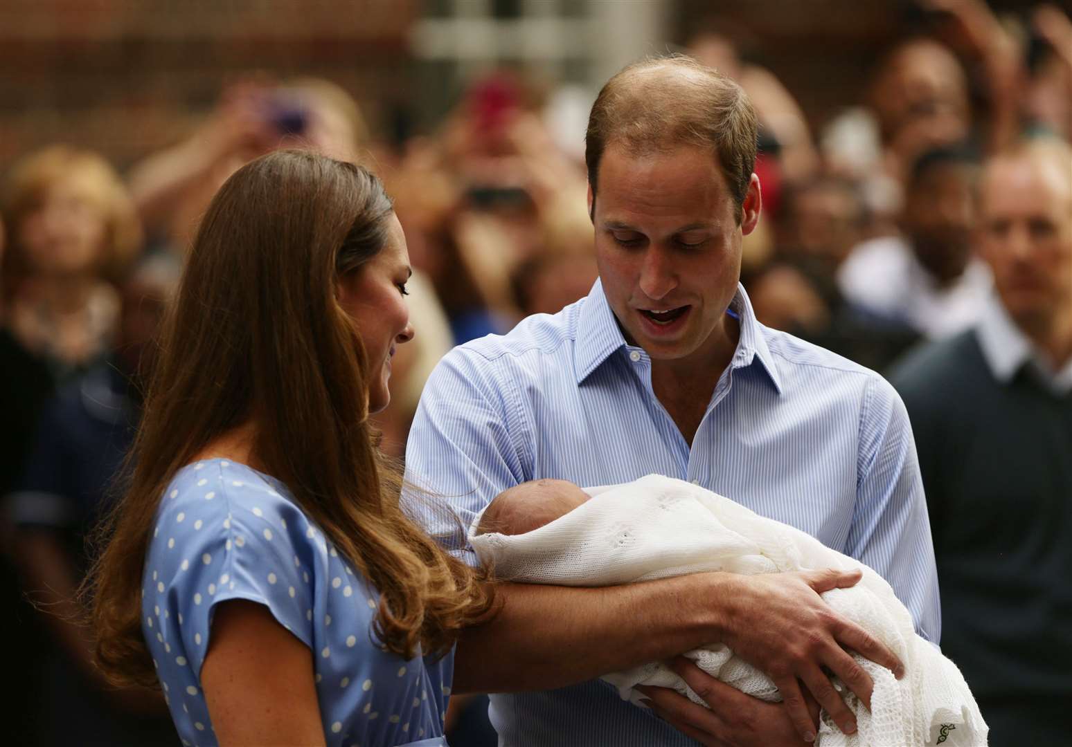 The Duke and Duchess of Cambridge pose outside the Lindo Wing (Yui Mok/PA)