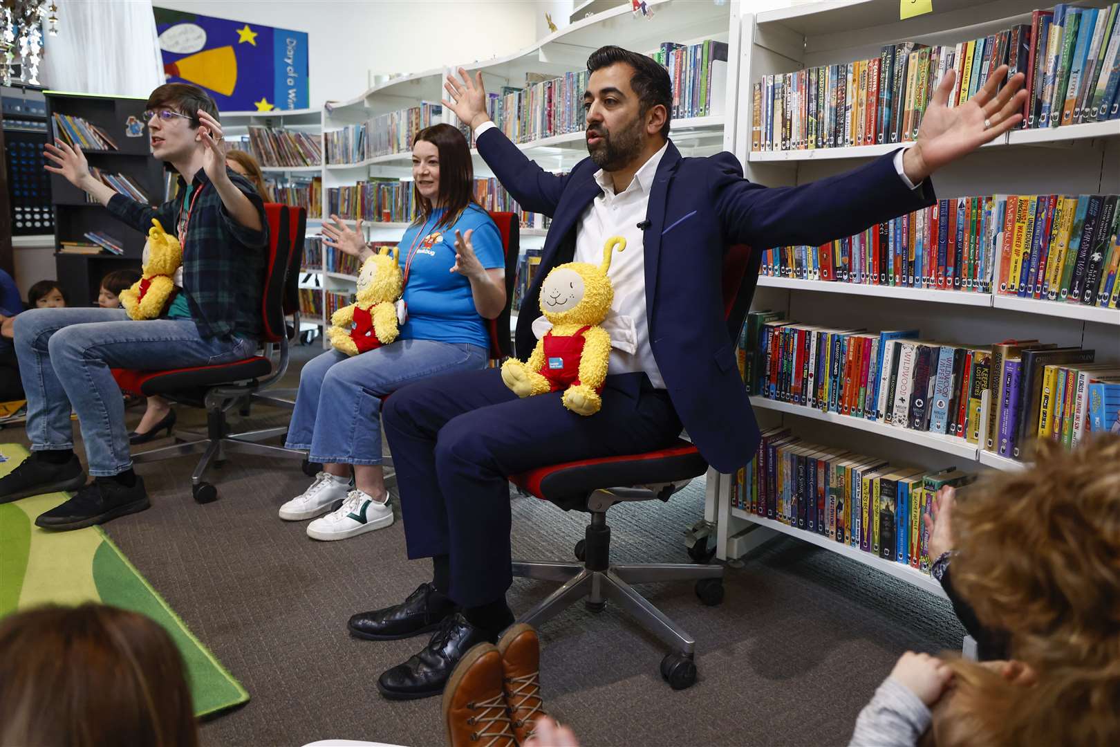 Humza Yousaf takes part in a bookbug session at Drumbrae Library Hub in Edinburgh (Jeff J Mitchell/PA)