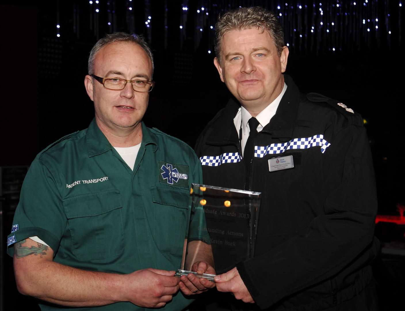 Kevin Buck getting his award from former Chief Supt Corbishley at the Maidsafe Awards Evening in 2014