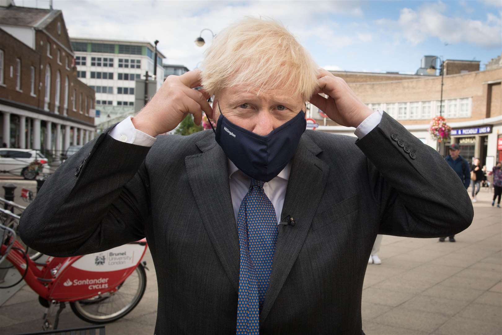 Prime Minister Boris Johnson meets shoppers and shopkeepers during a visit to his constituency in Uxbridge, west London (Stefan Rousseau/PA)