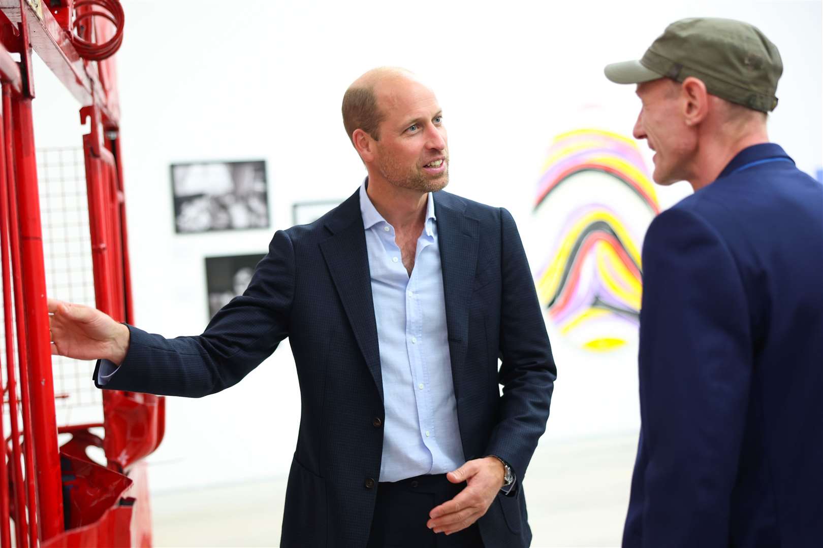 The prince chatted to award-winning social justice artist David Tovey during his visit to exhibition (Chris Jackson/PA)