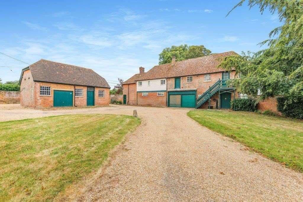 A separate three-bed cottage comes as part of the estate