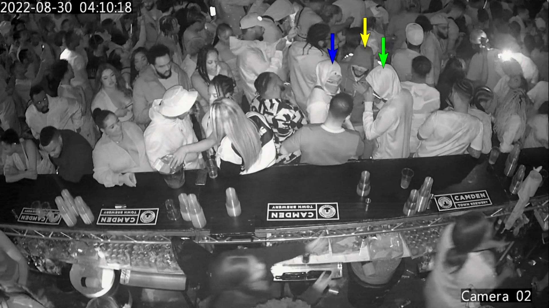 CCTV still of a masked man said to be Chris Kaba (blue arrow) with two co-defendants Connel Bamgboye, 29, (green arrow) and Shemiah Bell, 32, (yellow arrow) in the Oval nightclub before the shooting (CPS/PA)