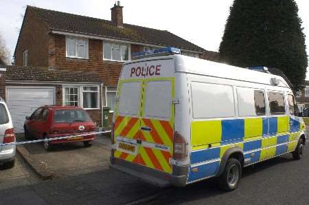 Police at the house in Mynn Crescent. Picture: GRANT FALVEY