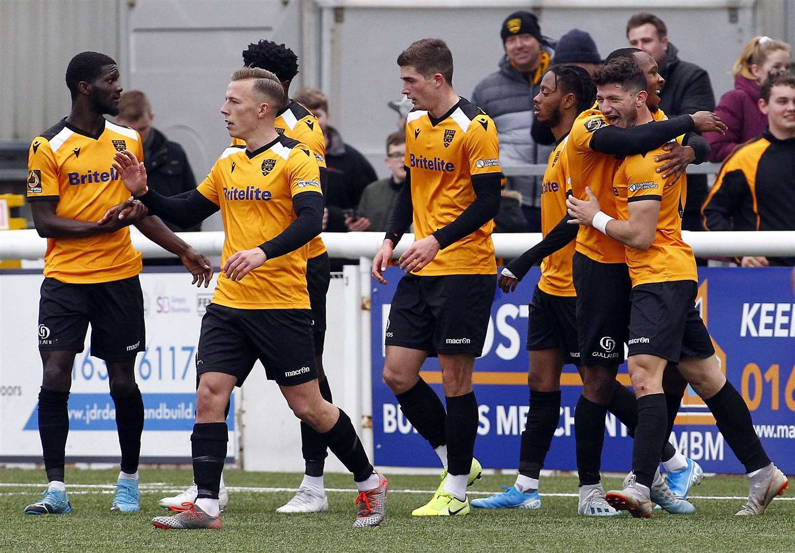 Delighted Maidstone midfielder Zihni Temelci, far right, celebrates his goal in front of the Genco Stand Picture: Sean Aidan