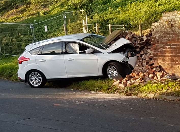 Part of the wall was demolished by the car. Picture: Andy Benzies