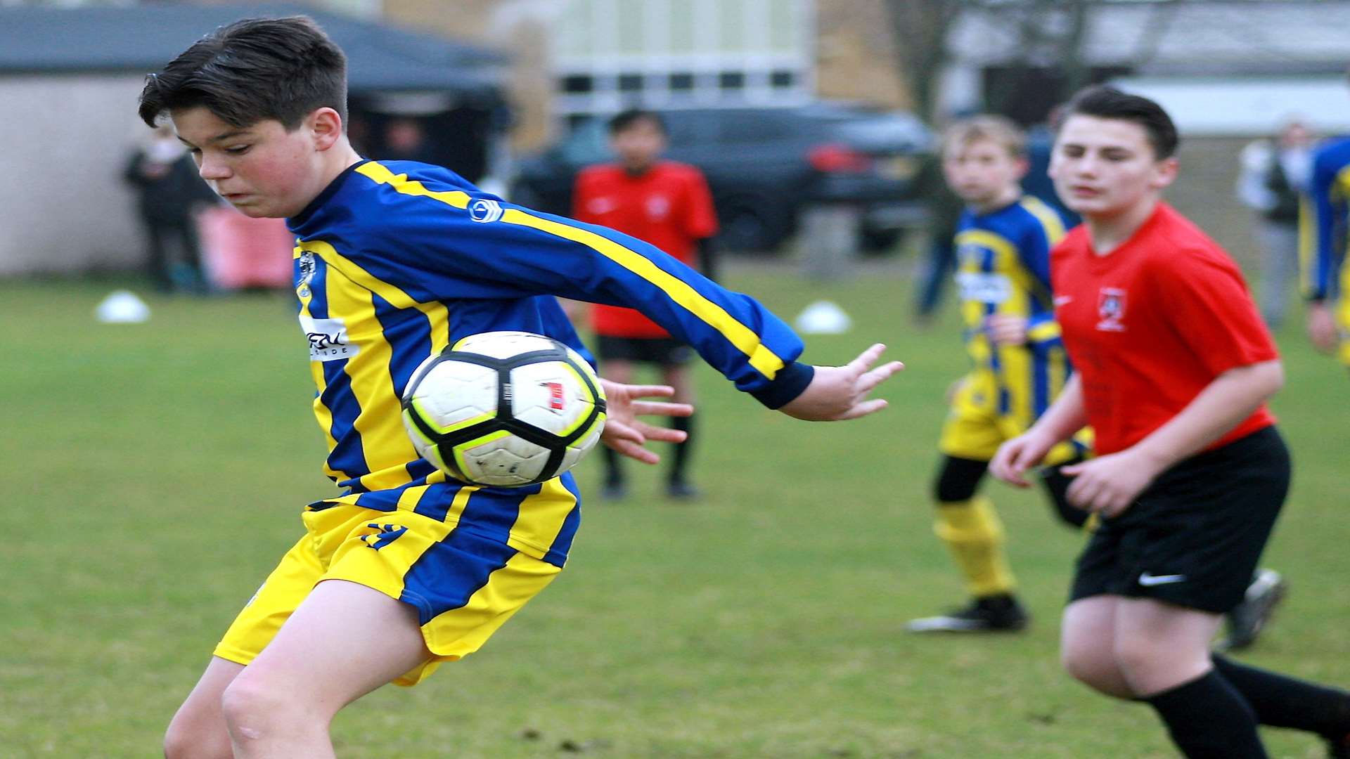 Milton & Fulston United under-14s bring the ball under control against Thamesview under-14s. Picture: Phil Lee