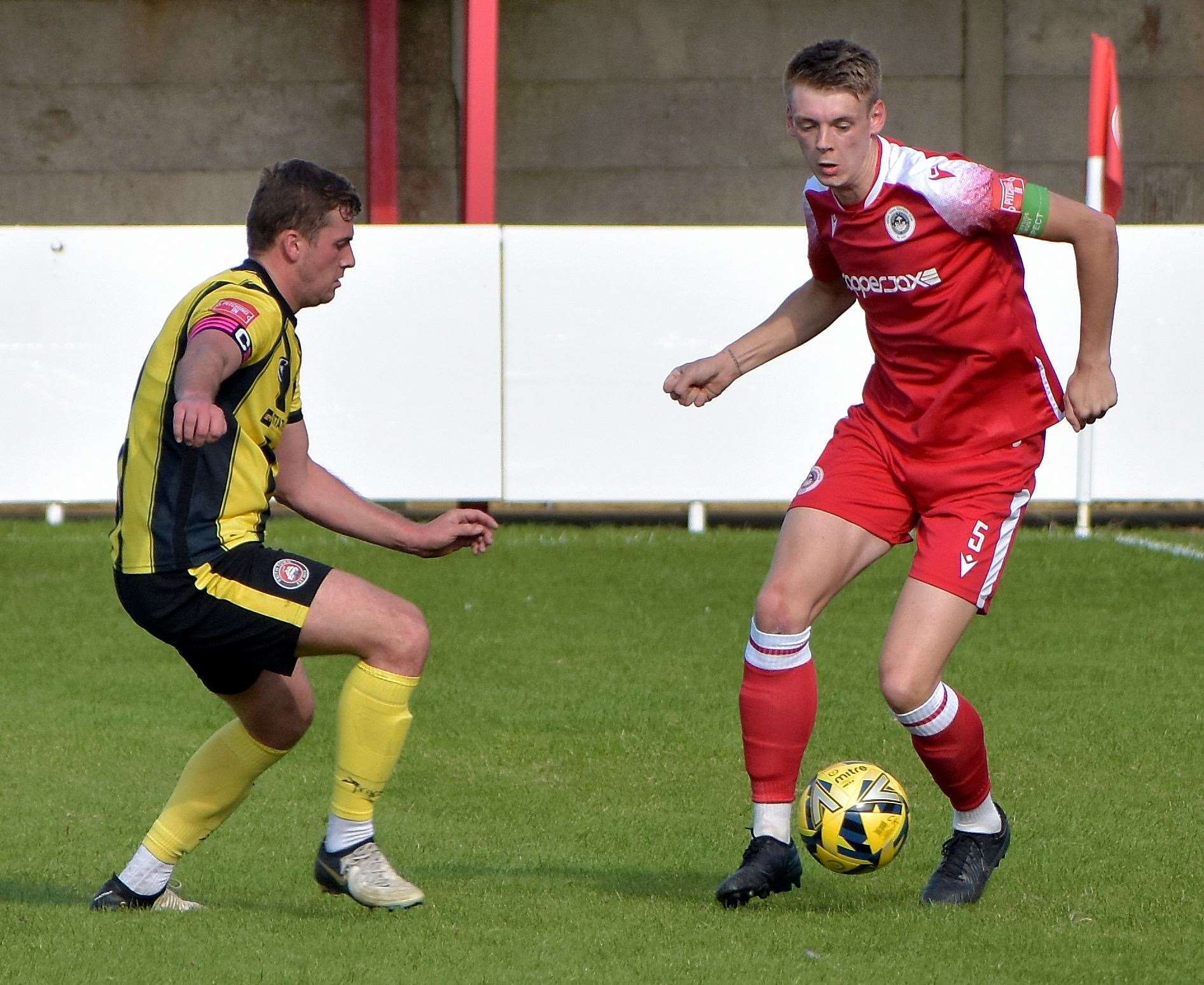 Hythe captain Lex Allan in possession against Erith Town. Picture: Randolph File