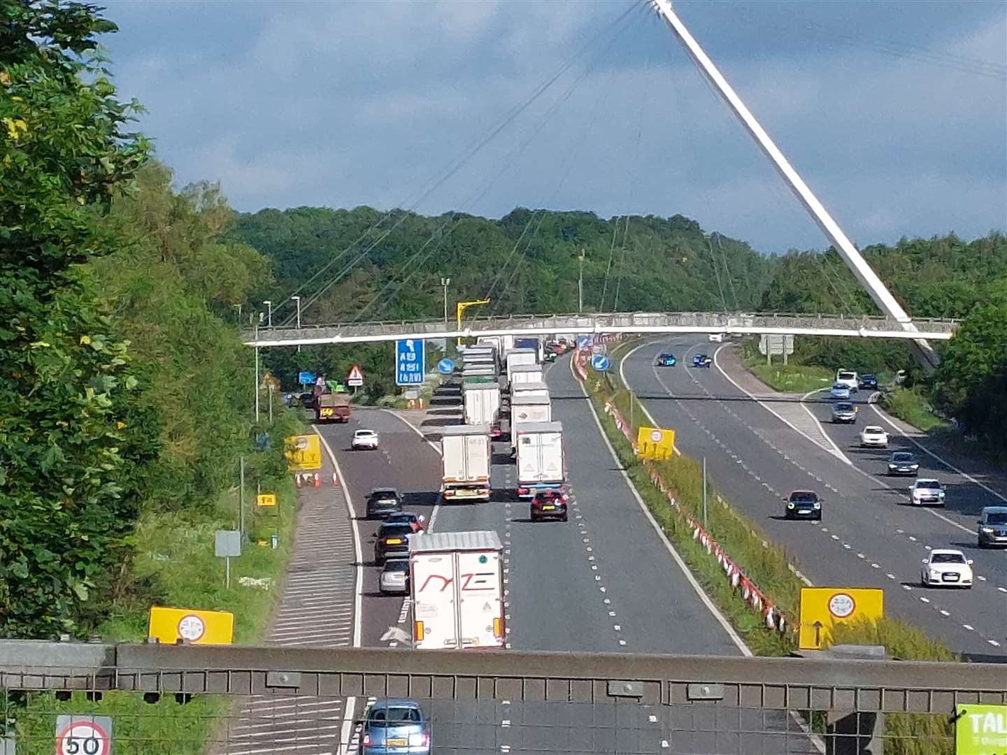 Traffic was stopped on the M20 London-bound between Junction 9 for Ashford and Junction 8 for Leeds Castle following a crash