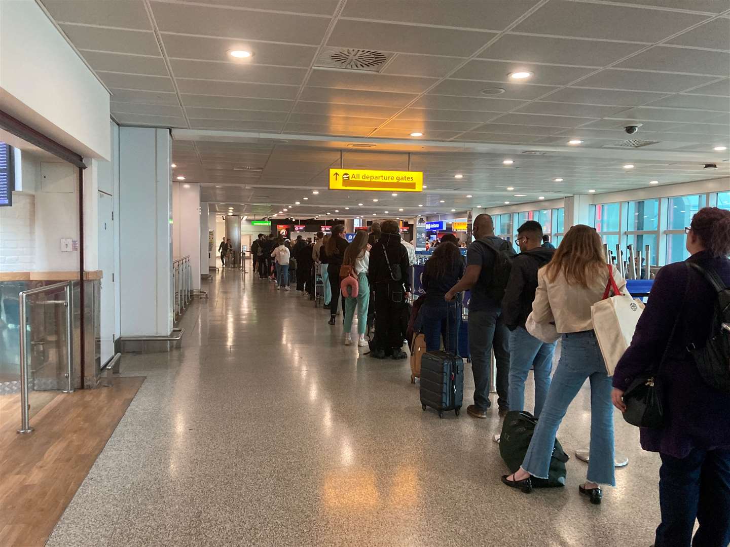 Passengers queue for flights at Heathrow Airport (Ben Smith/PA)