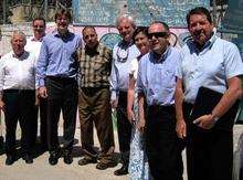 Group photo at the Al-Ameri camp with Bob Neil MP (Bromley &amp; Chiselhurst), Robert Shetler-Jones, Greg Clark MP (Tunbridge Wells), UN camp manager, Stephen O'Brien MP (Eddisbury), Pauline Latham (PPC Mid Derbyshire), Robert Halfon (PPC Harlow), and Gordon Henderson.