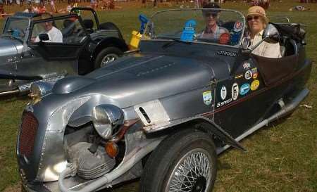 Gordon Smart and Pam Smith in their 1991 Lo Max at the Chatham to Margate vintage car rally. Picture: STEVE CRISPIE