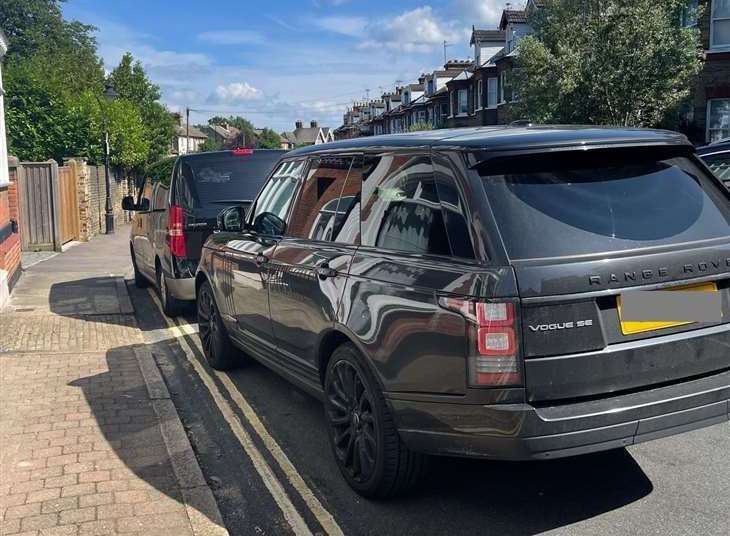 Cars parking on double yellow lines on Roebuck Road