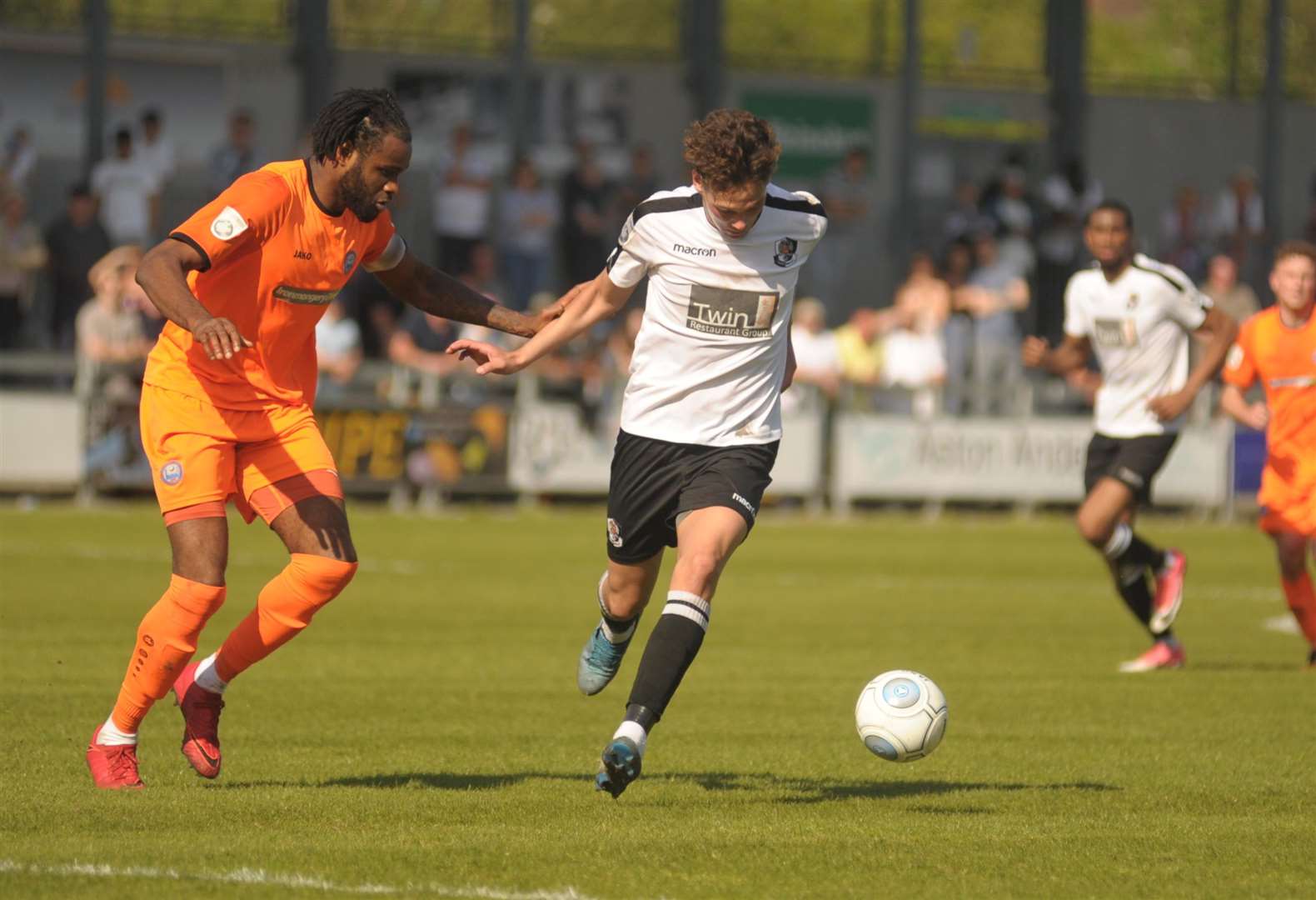Alfie Pavey up against Braintree captain Marc-Anthony Okoye in the play-off semi-final Picture: Steve Crispe