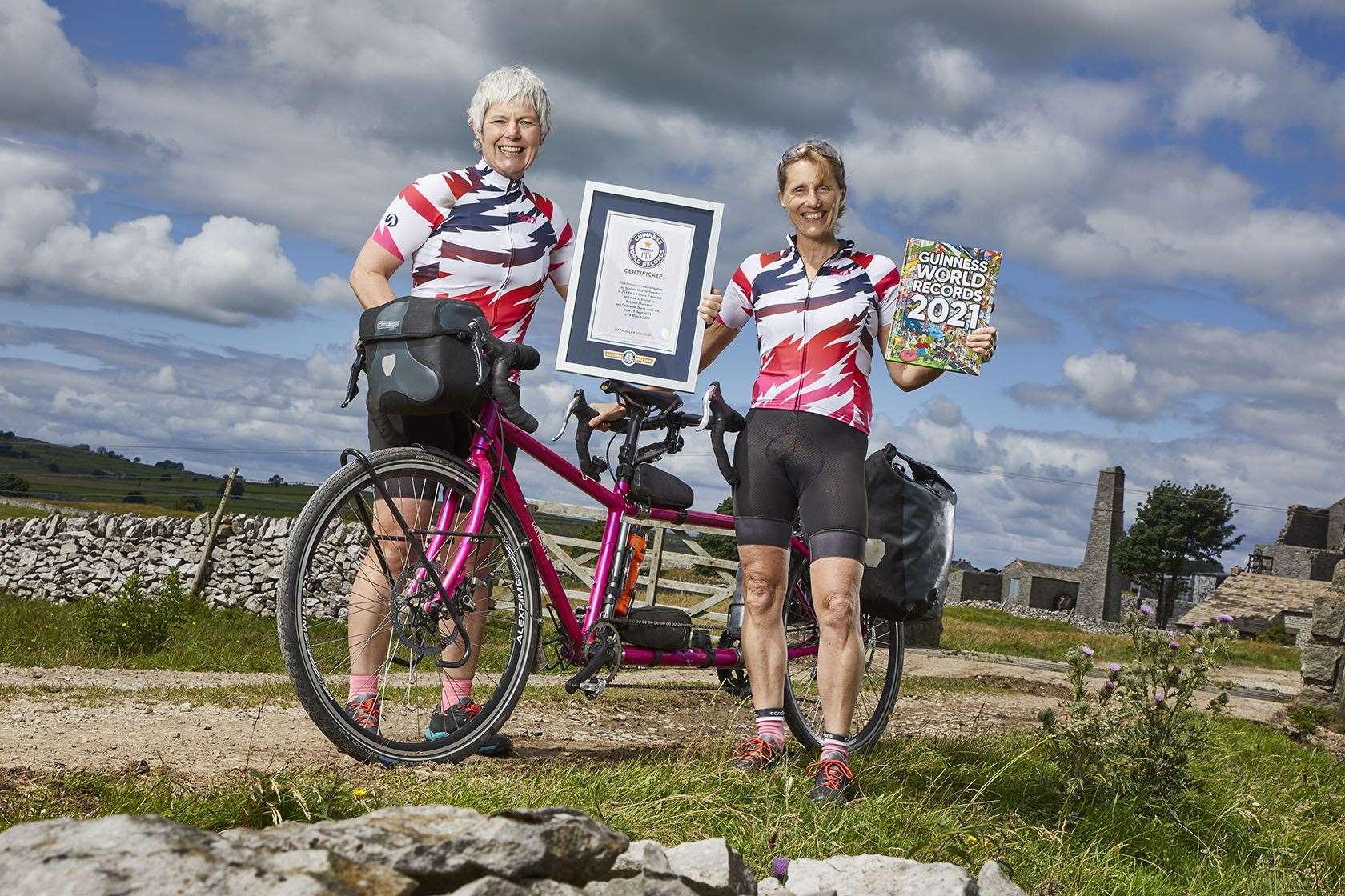 Cat Dixon, left, and Raz Marsden with their record certificate (Guinness World Records/PA)