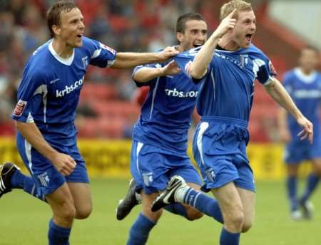 Goal hero: Gary Mulligan celebrates his dramatic equaliser. Picture: Matthew Walker