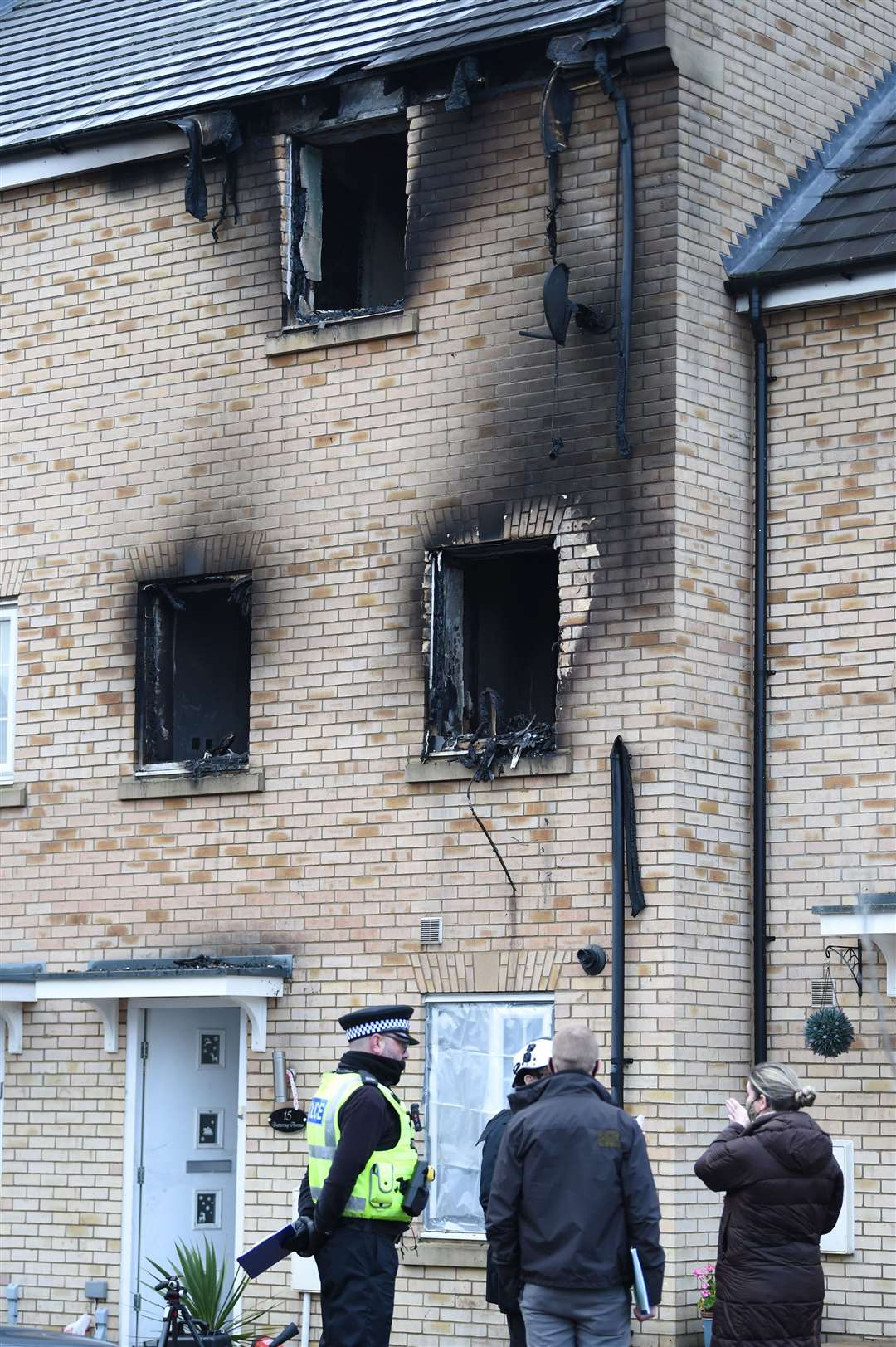 Emergency services at the scene of the house fire in Eynesbury, Cambridgeshire (Joe Giddens/PA)