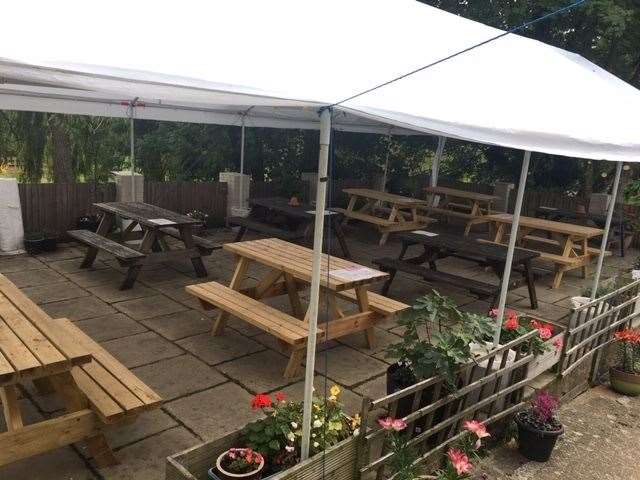 The new owners have gone to a good deal of trouble to install a marquee covering at least 10 picnic benches at the back of the pub