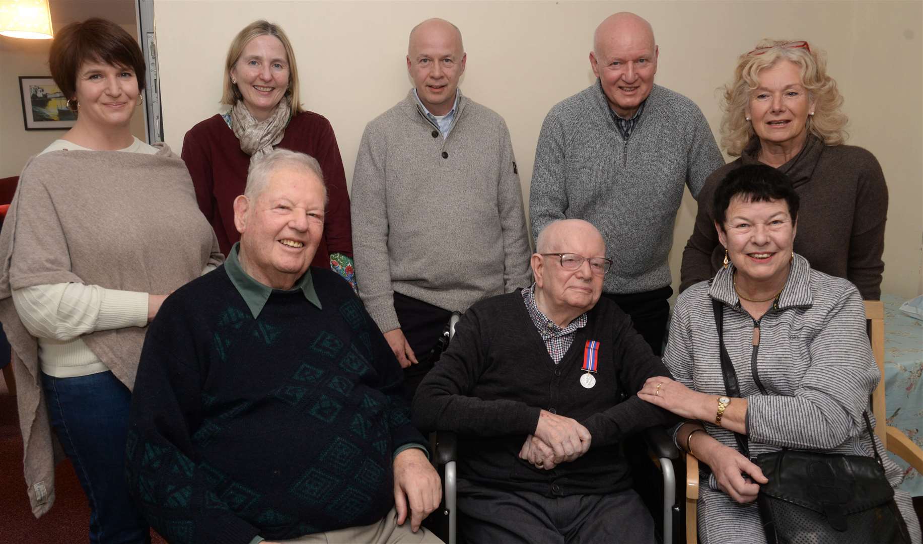 Albert Gear, wearing his much overdue medal, with brother Eric, granddaughter Alison Bright, daughter-in-law Nicola Gear, sons Geoff and Michael, daughter-in-law Lydia Gear and daughter Susan Stephenson