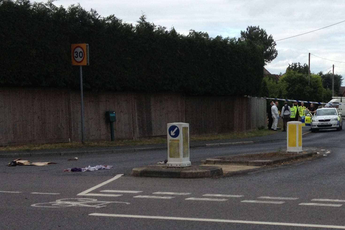 Forensic officers close to the Texaco petrol station in West Kingsdown