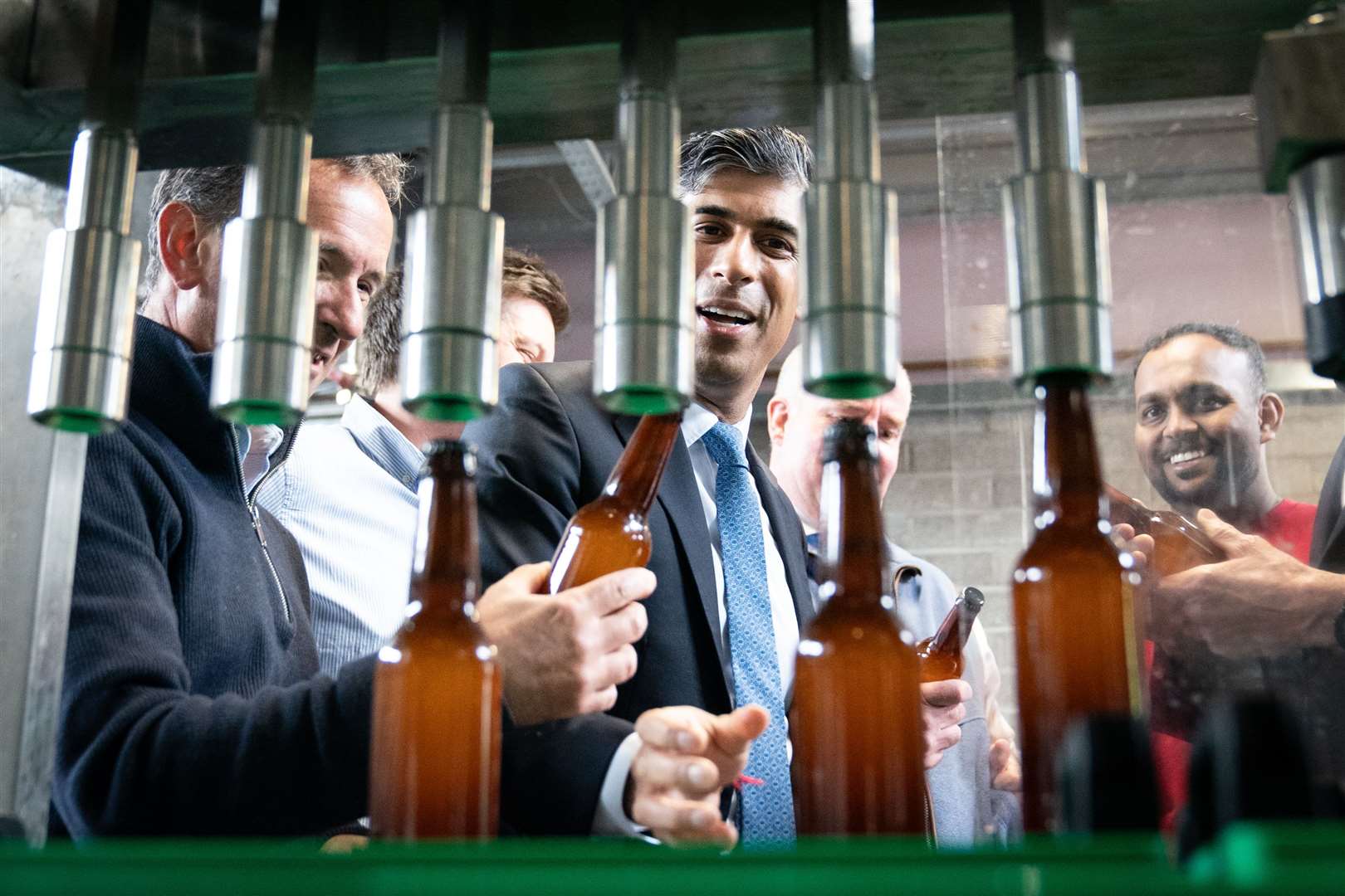 Prime Minister Rishi Sunak meets members of staff at the Vale of Glamorgan Brewery, in Barry, south Wales (Stefan Rousseau/PA)
