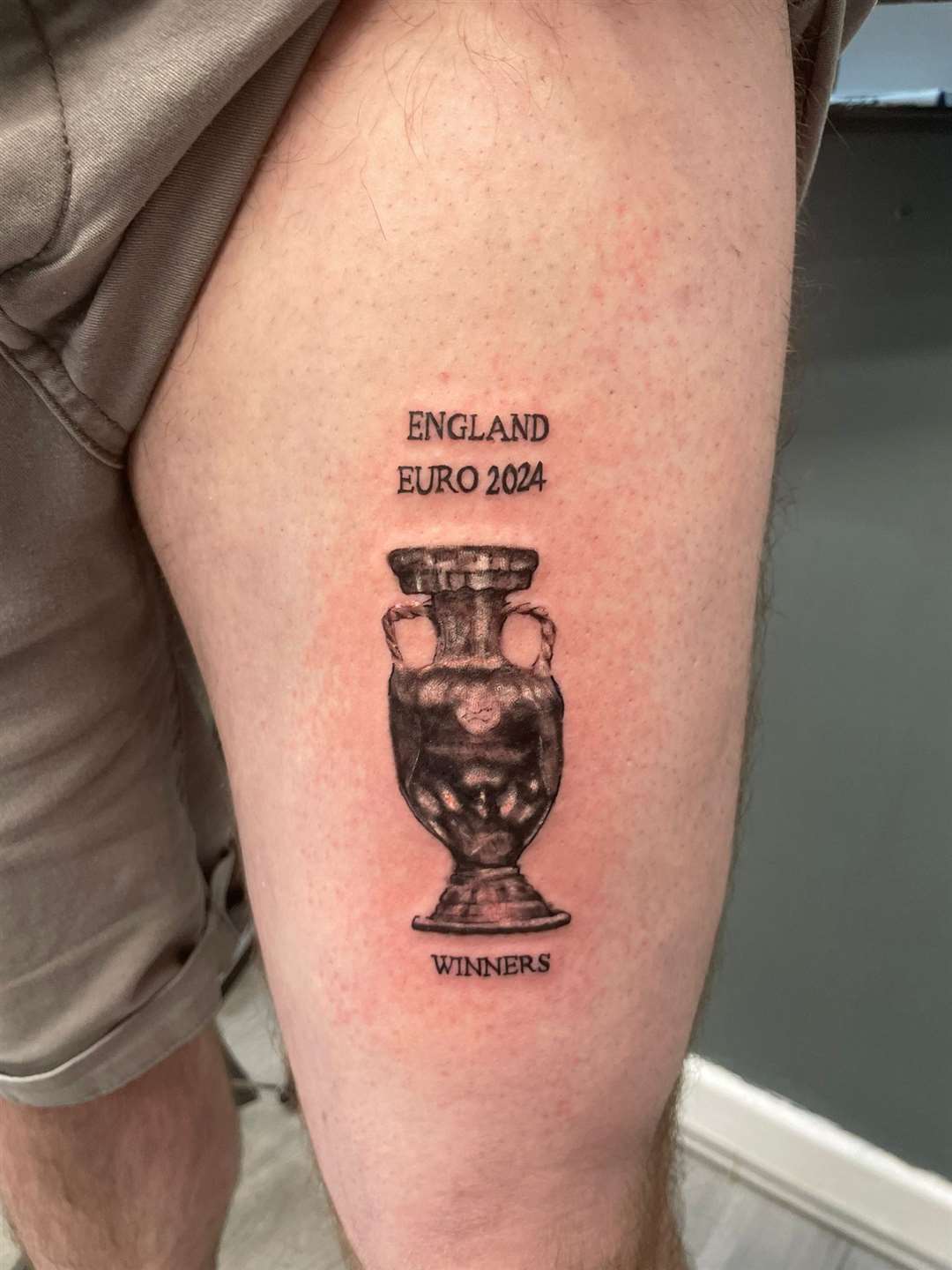 Dan Thomas from Swindon marked his confidence in England becoming Euro champions with a tattoo of a trophy and the words “England Euro 2024 Winners” three days before the final match (Dan Thomas)