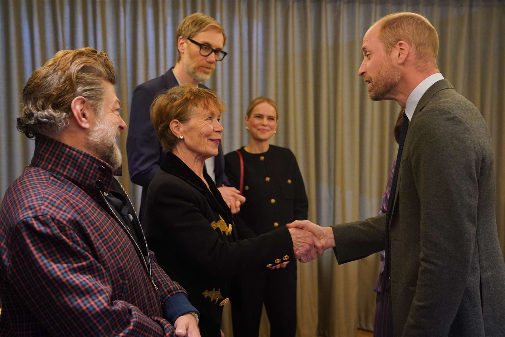 The Prince of Wales speaks to (left to right) Andy Serkis, Celia Imrie, Stephen Merchant and Mircea Monroe during the visit (Jonathan Brady/PA)