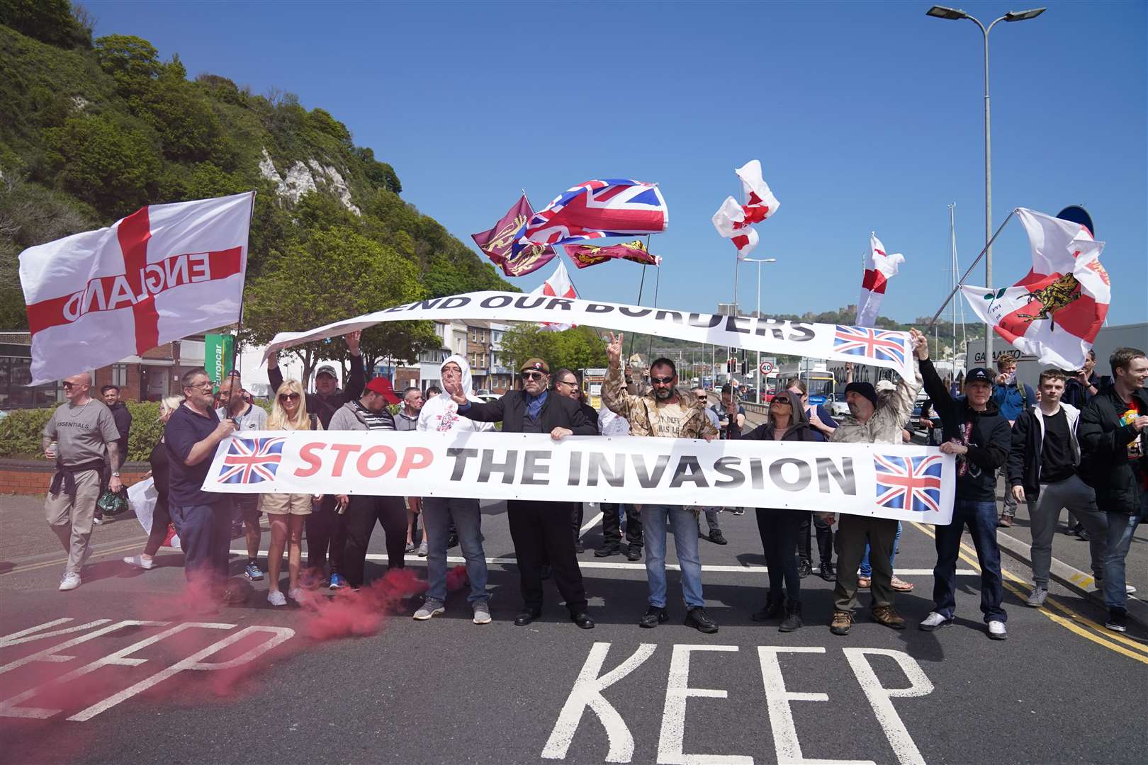 Anti-migrant protesters demonstrate in Dover against immigration and the journeys made by refugees crossing the Channel to Kent. Picture date: Saturday May 29, 2021.