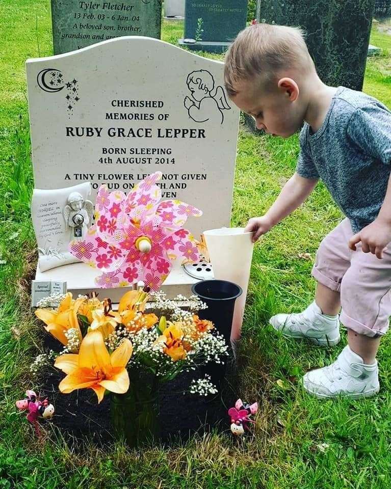 Mayce at Ruby's grave at St Peter's Church, Bredhurst. Picture: Charlotte Day