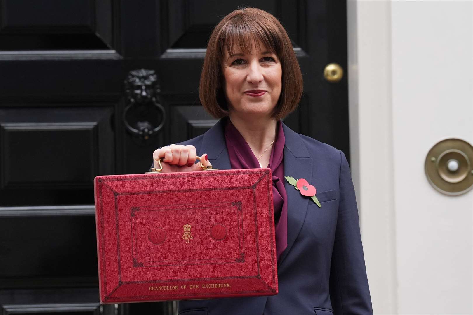 Chancellor Rachel Reeves poses outside 11 Downing Street (Lucy North/PA)