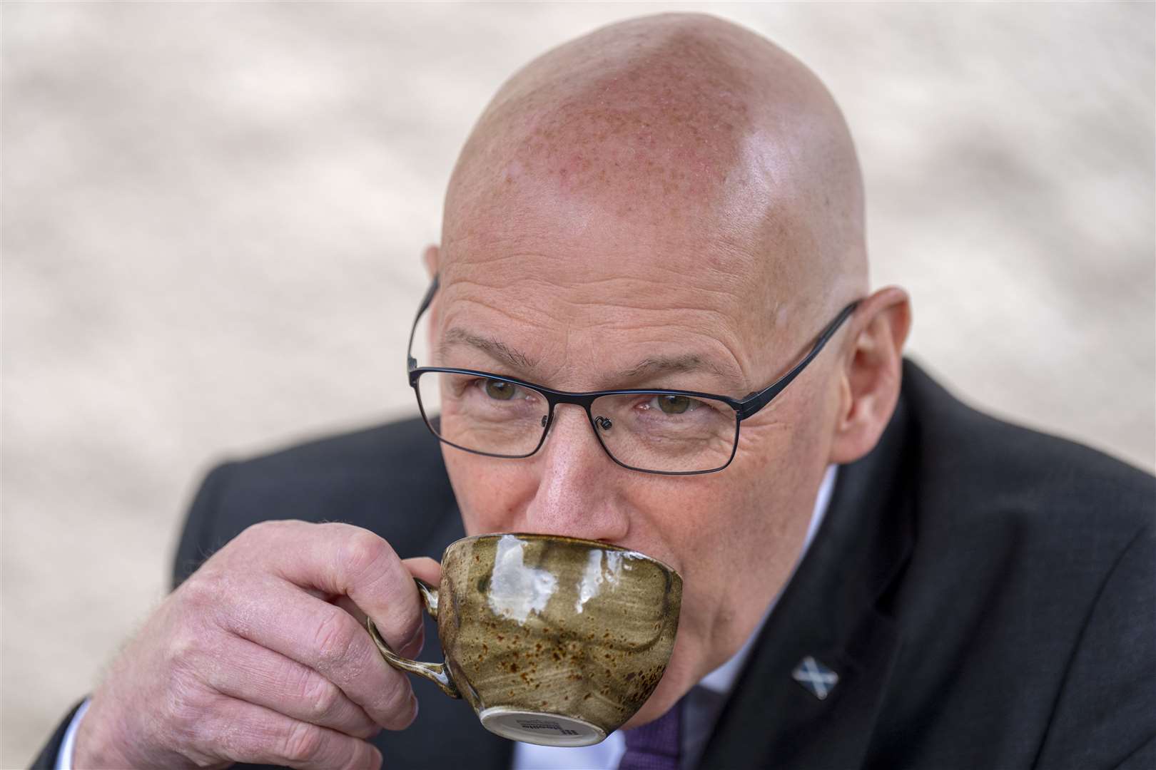 John Swinney refuels during a visit to The Dower House Cafe in Edinburgh (Jane Barlow/PA)