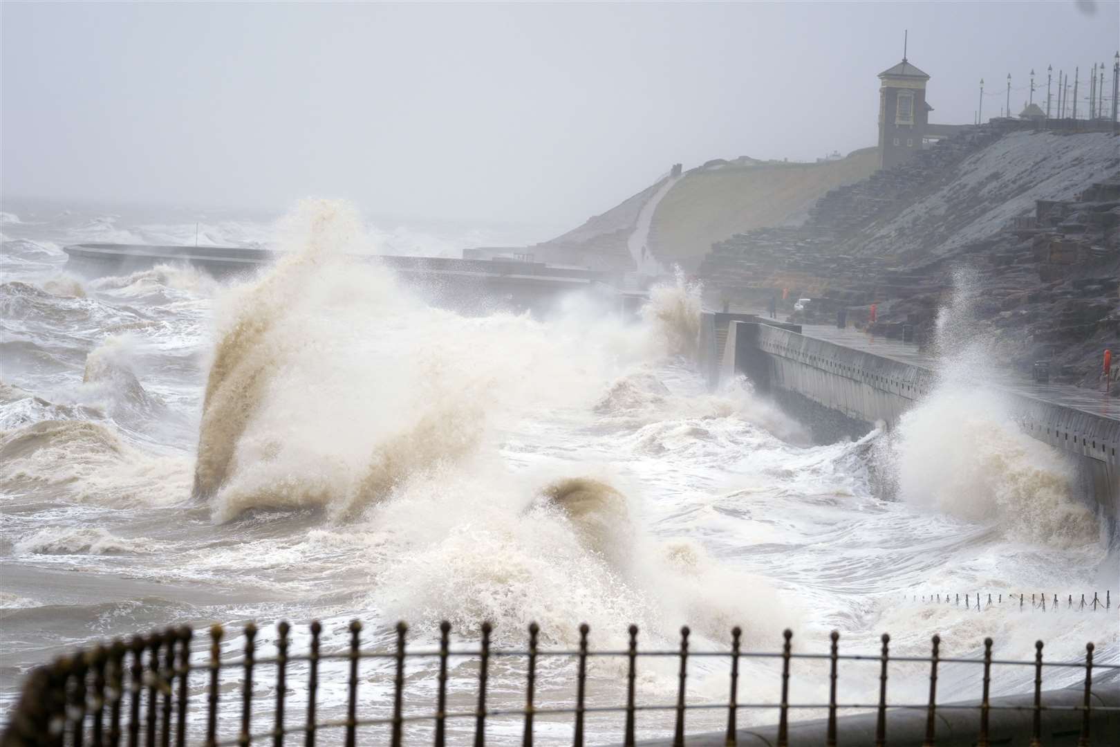 Waves break on the seafront in Blackpool (Peter Byrne/PA)