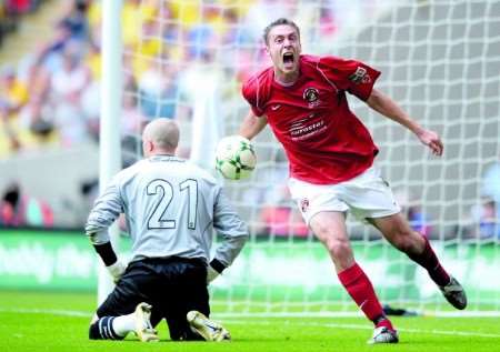 Chris McPhee celebrates his FA Trophy match-winner last month. Picture: Barry Goodwin