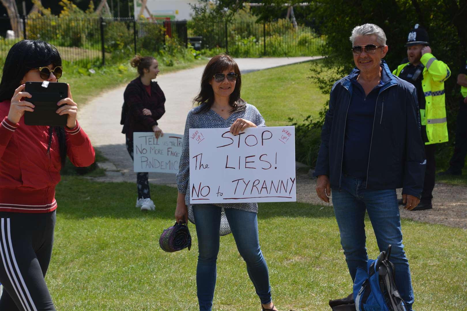 A police officer looks on as protesters gather on Southampton Common (Ben Mitchell/PA)