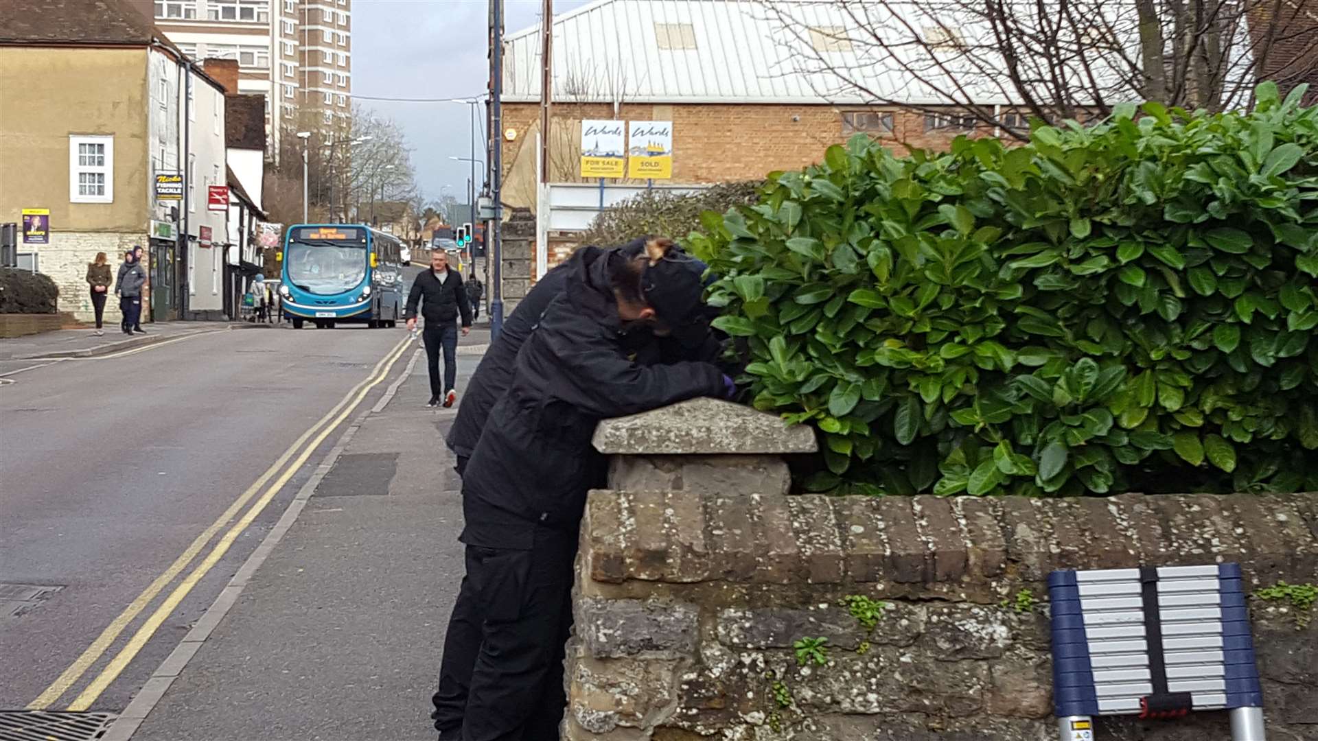 Officers in Knightrider Street looking for evidence after the murder of Wesley Adyinka